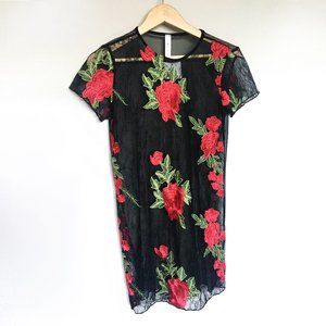 Black mesh dress with embroidered flowers
